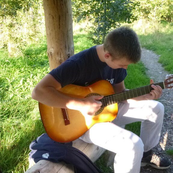 Boy playing guitar